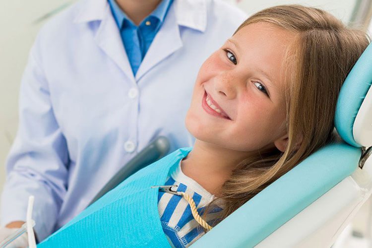 a kid in a dental clinic