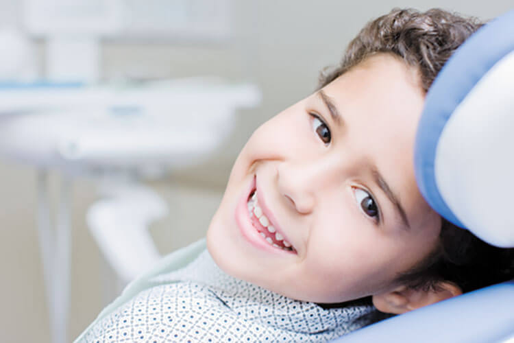 a kid in a dental clinic
