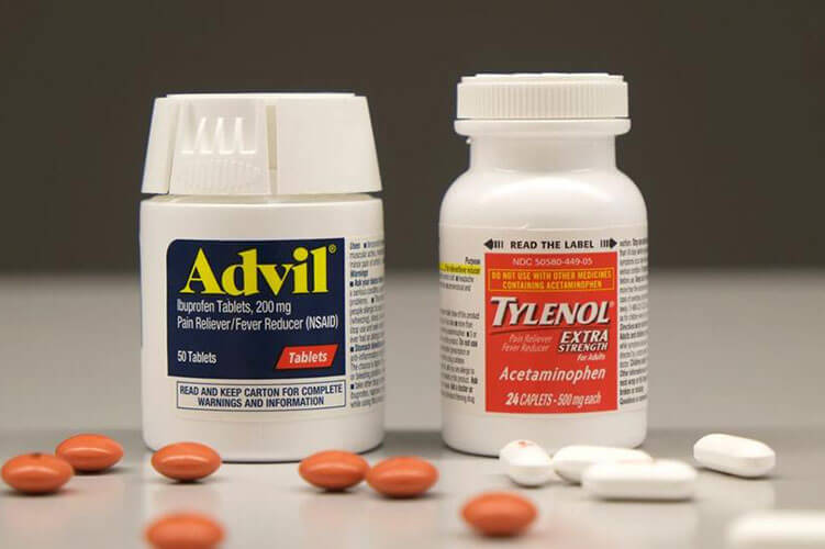 a bottle of Advil and Tylenol