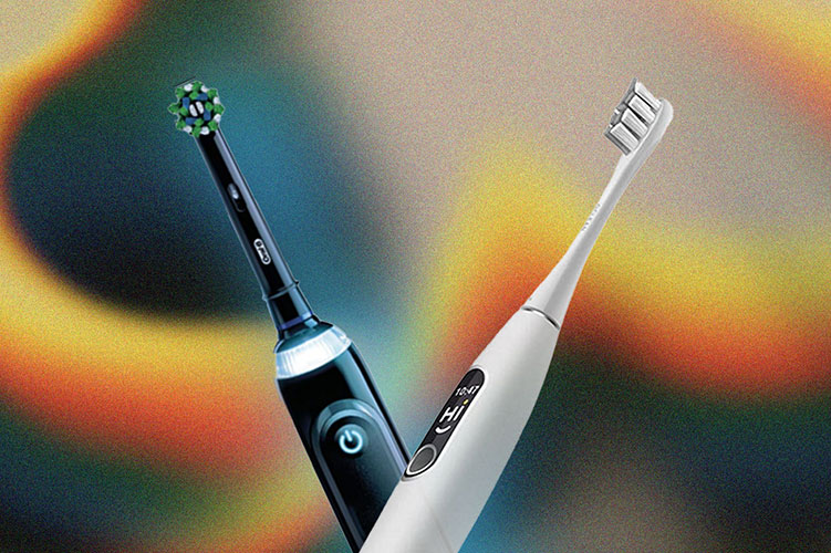 white and black electric toothbrushes